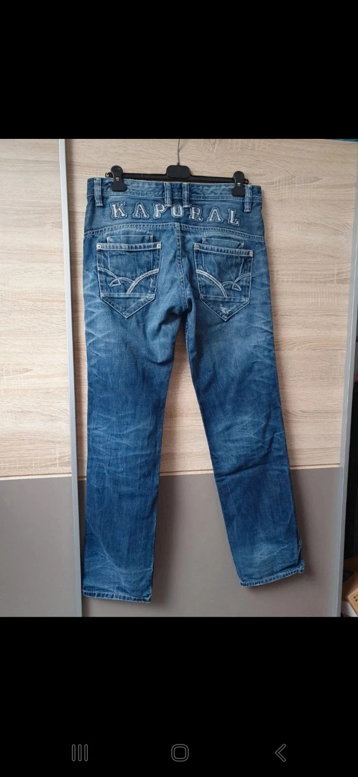 Calça jeans com rasgos – photo 2